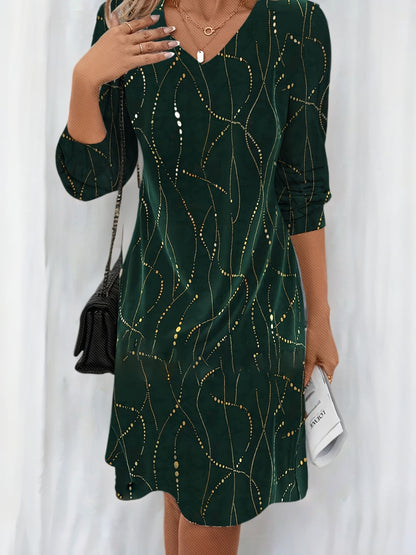 Robe verte motif doré