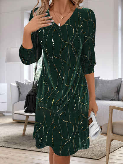 Robe verte motif doré